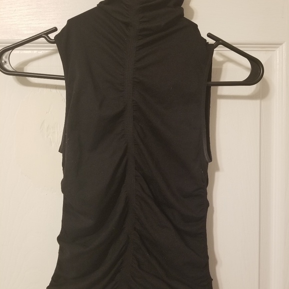 bebe Tops - Bebe black sleeveless turtle neck bebe Tops - Bebe black sleeveless turtle neck